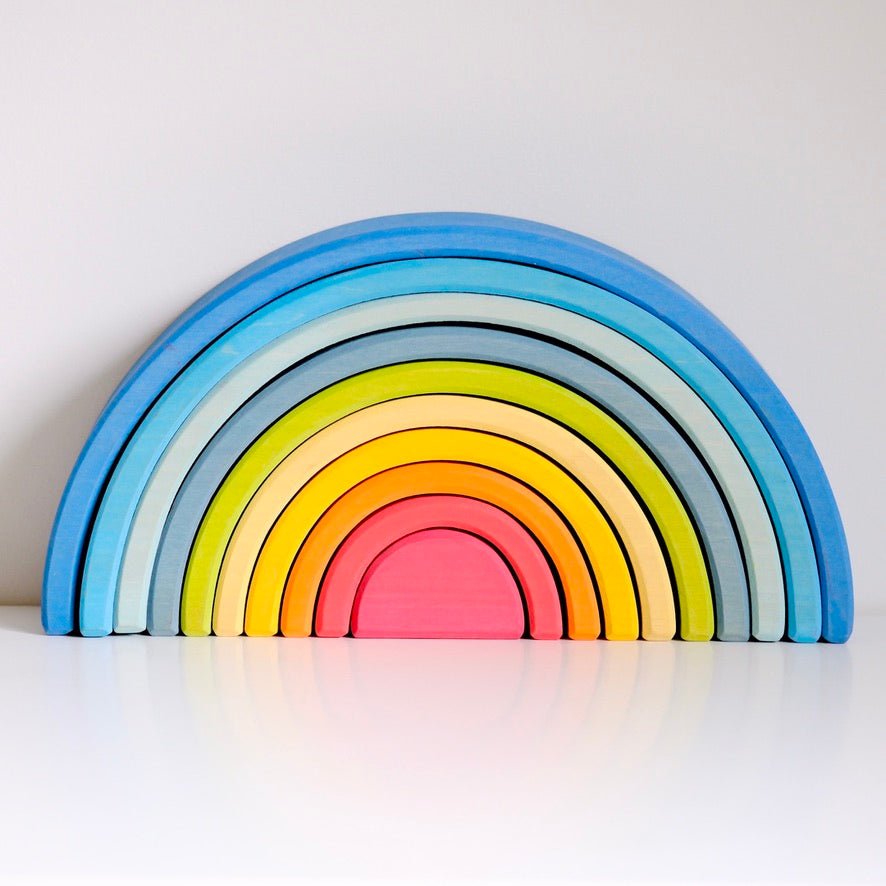 colorful wooden rainbow stacker toy for toddler play